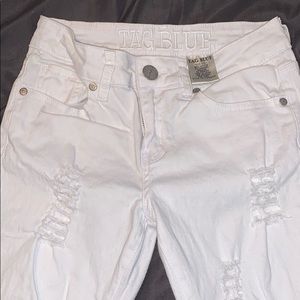 White ripped jeans